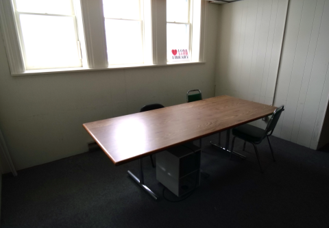 Wellington Small Meeting Room with table and chairs. 