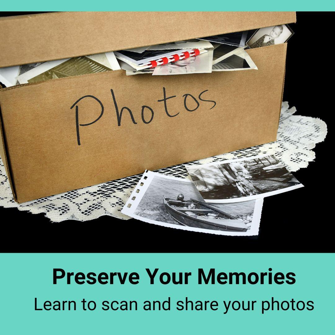 a cardboard box open with photographs coming out of it